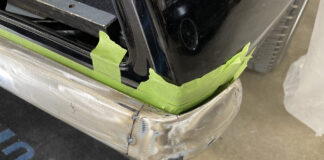 000 1969 Camaro rear bumper corner tack welded and metal finished for seamless body line integration