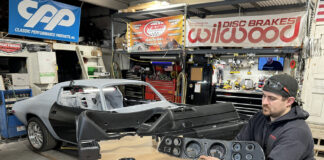 000 Technician preps a 1971 Camaro dash and gauge cluster for install wiring harnesses laid out for final fitment