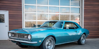 001 1968 Chevy Camaro in LeMans Blue with 350 badging and rally wheels sits in original condition