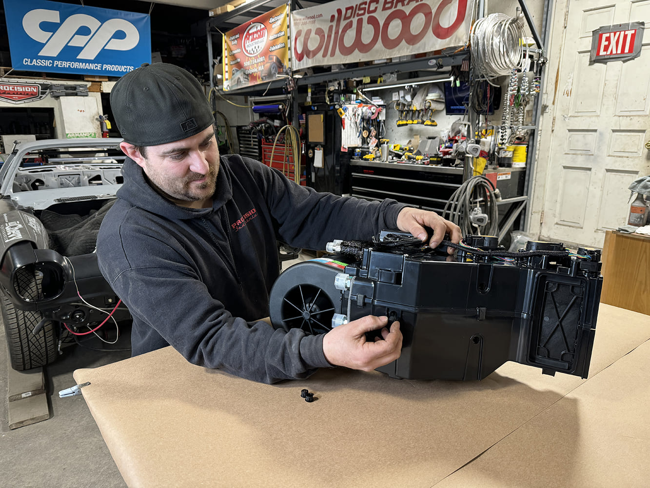 001 Assembling a Vintage Air AC evaporator case for a 1971 Camaro on the shop workbench