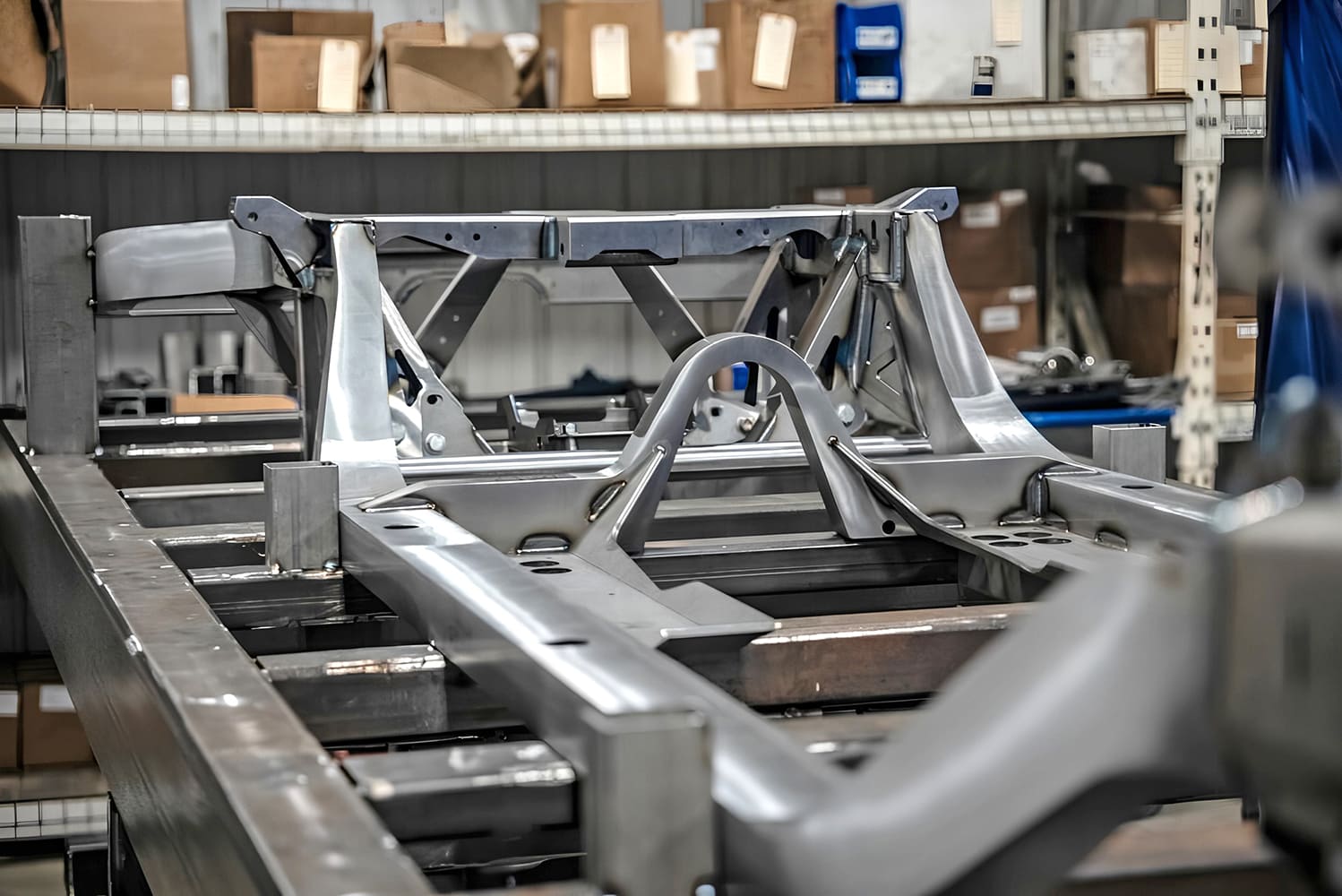 005 1968 Camaro full frame chassis mockup under construction on a fixture table