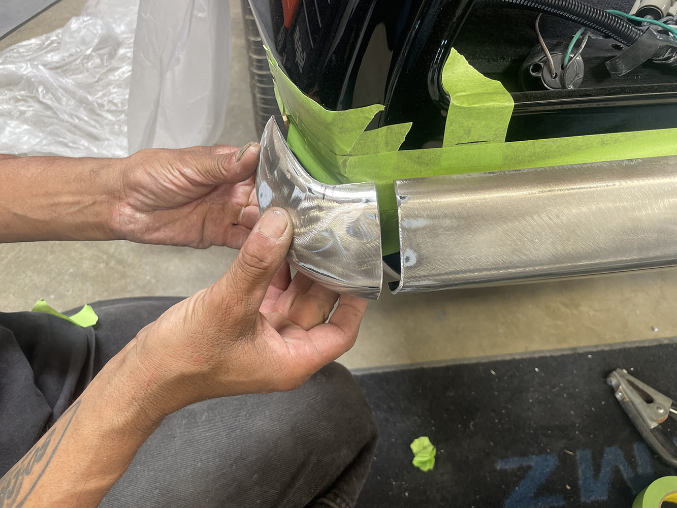 006 1969 Camaro rear bumper corner held in place to verify gap and profile consistency