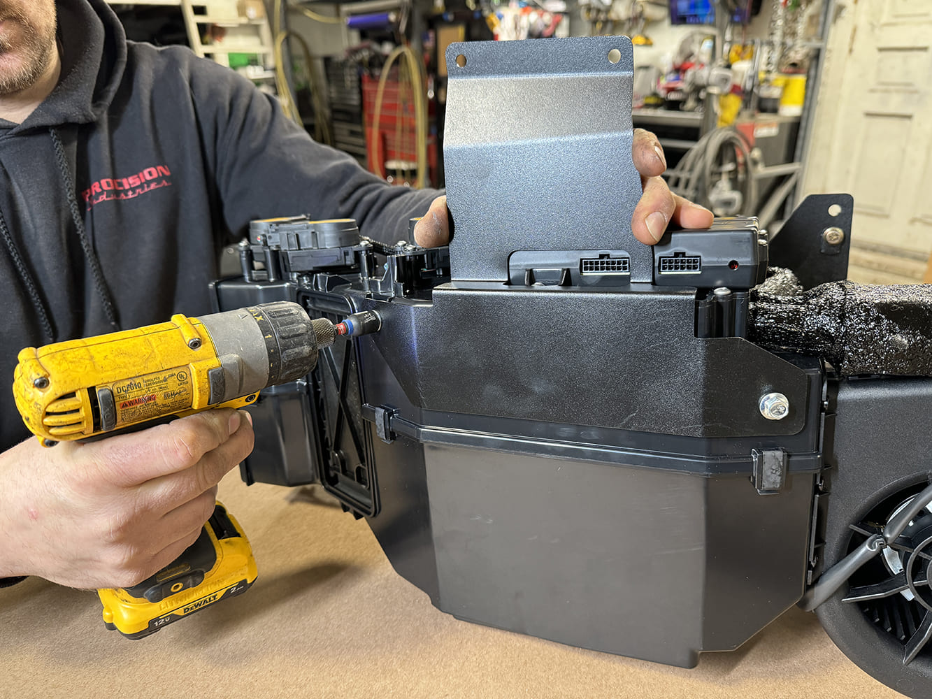 008 Mounting ECU bracket with a cordless drill to 1971 Camaro AC evaporator box
