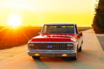 01 1972 Chevy C10 front view sunset red white chrome grille LED headlights custom bumper