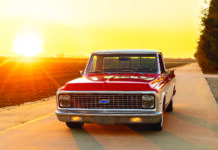 01 1972 Chevy C10 front view sunset red white chrome grille LED headlights custom bumper