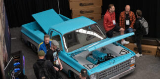 01 Mobile Tech Expo 2025 custom turquoise Chevy C10 bagged supercharged LS build indoor showcase