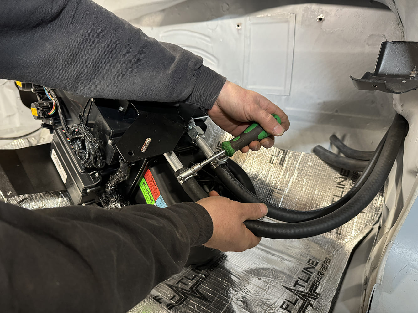 010 Clamping down AC hoses onto the evaporator core inside the 1971 Camaro firewall area