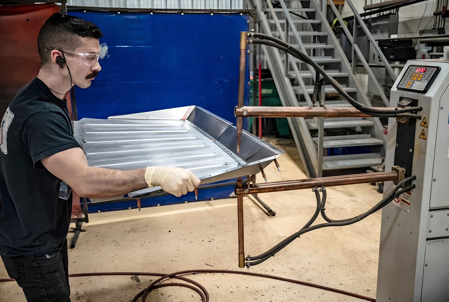 011 1968 Camaro trunk pan spot welded in fixture using dual arm resistance welder for precision