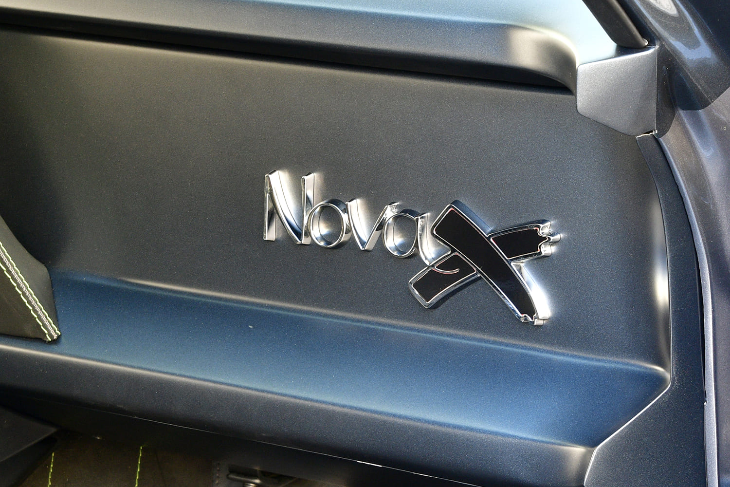 011 1968 Chevy Nova features custom Nova X dash emblem with metallic black on chrome finish
