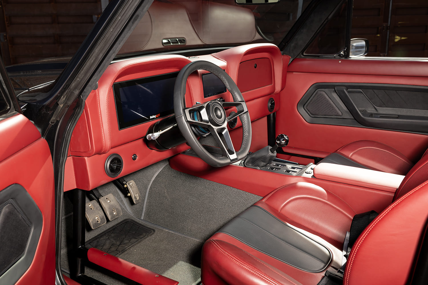 013 1966 Chevy Nova red custom interior with Holley EFI dash and race style steering