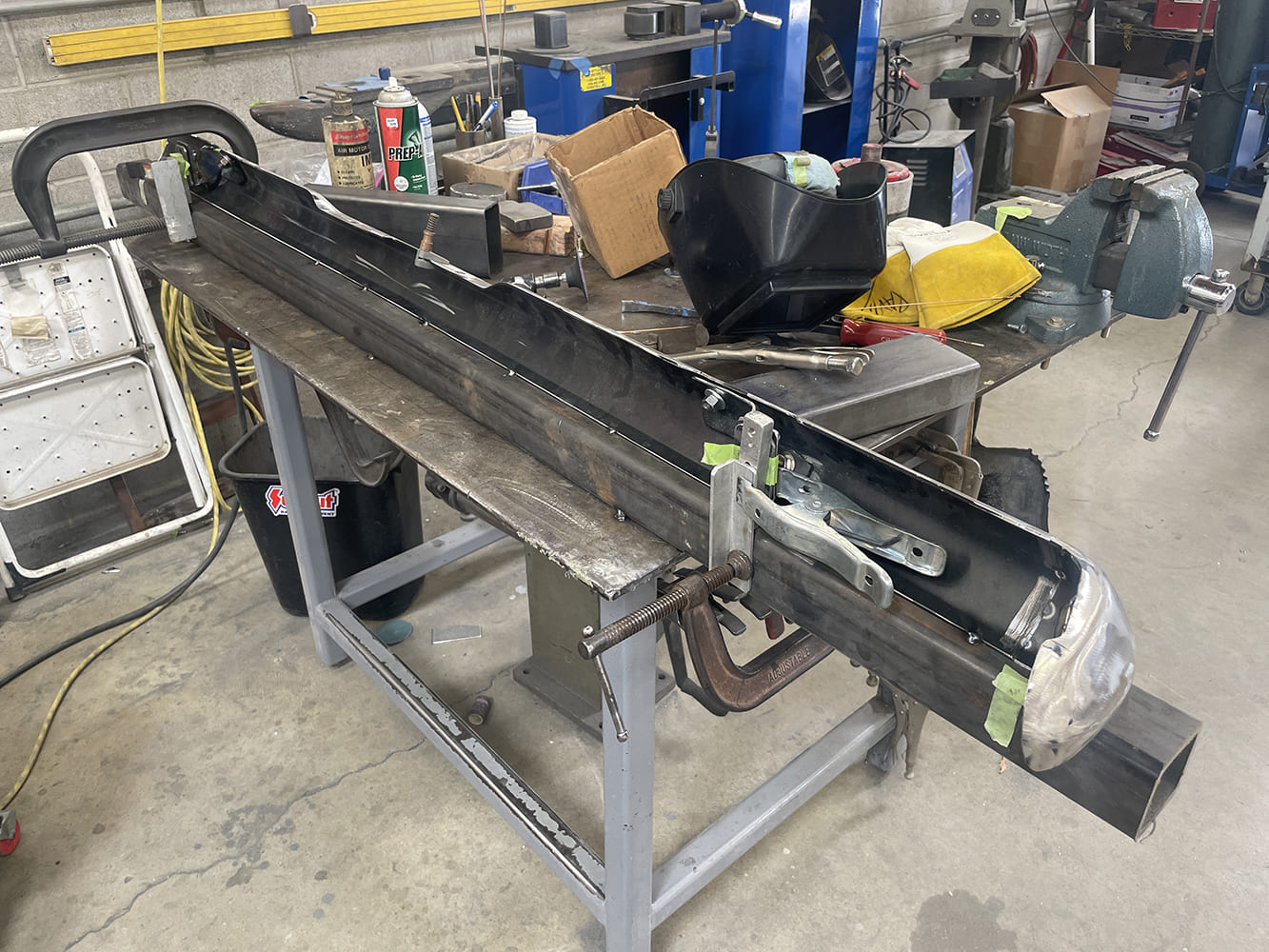 013 1969 Camaro bumper clamped to support bar during internal bracket fabrication