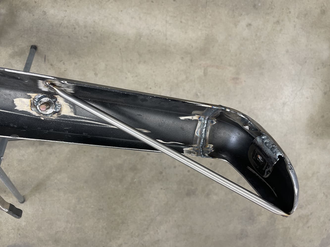 014 1969 Camaro bumper reinforced with custom fitted internal bracing rod for added strength