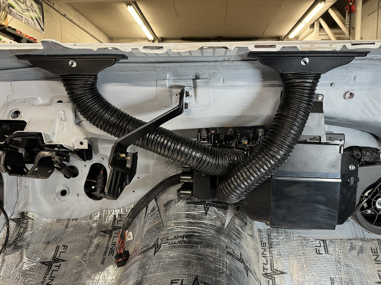 015 Dual ducts secured and routed cleanly under the dash of the 1971 Camaro