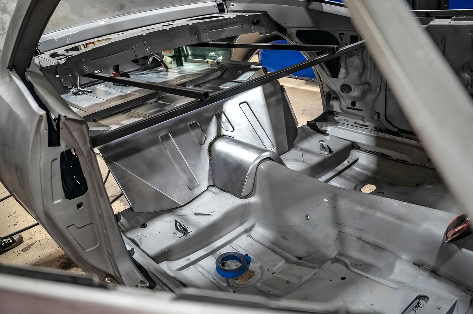 018 1968 Camaro mini tub trunk pan mocked in place inside body shell for fitment