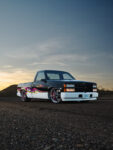 02 1993 Chevy OBS slammed front view with white bumper chrome wheels and multicolor side graphics
