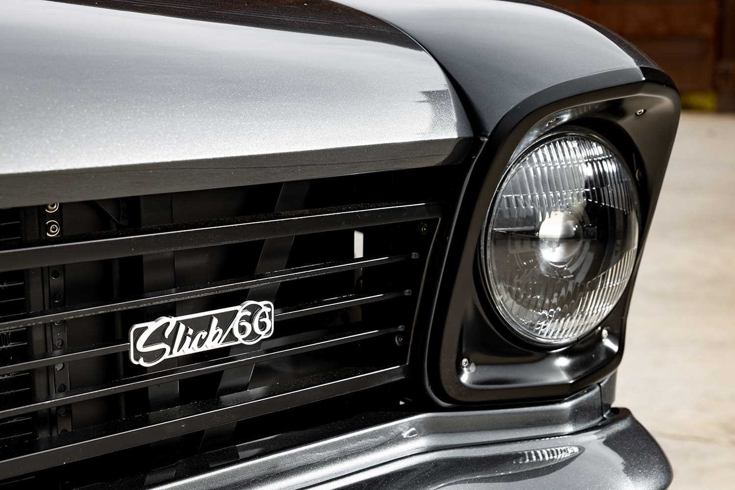 021 1966 Chevy Nova custom “Slick 66” grille with matte black bezels and retro halogen headlight