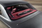 023 1966 Chevy Nova rear glass reveals red and black roll bar interior design