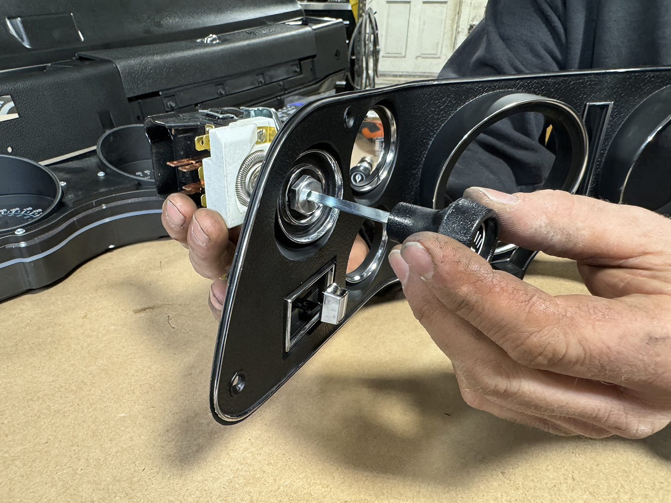 026 Installing the headlight switch into the cluster bezel for the 1971 Camaro dashboard