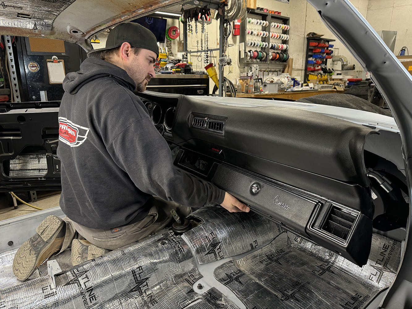 029 Fitting the completed dash assembly into the cabin of the 1971 Camaro