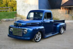 04 Sunset lit 1950 Ford F1 hot rod with smoothed lines custom headlights and chrome accents