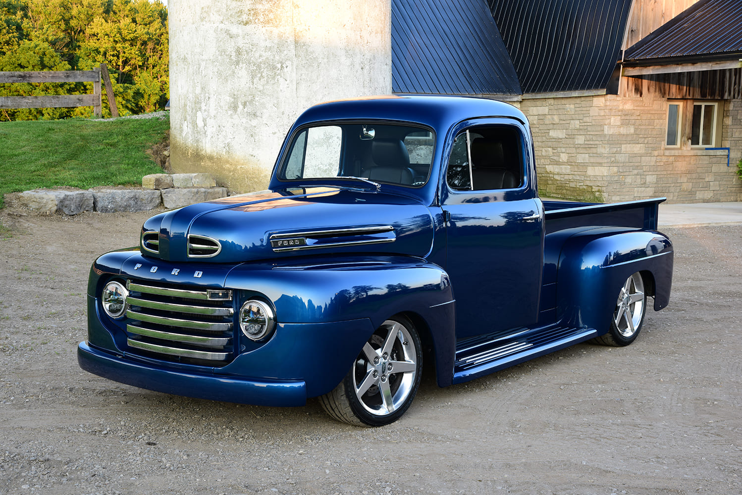 04 Sunset lit 1950 Ford F1 hot rod with smoothed lines custom headlights and chrome accents