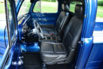 08 Modern bucket seat interior in 1950 Ford F1 with center console and black leather upgrade