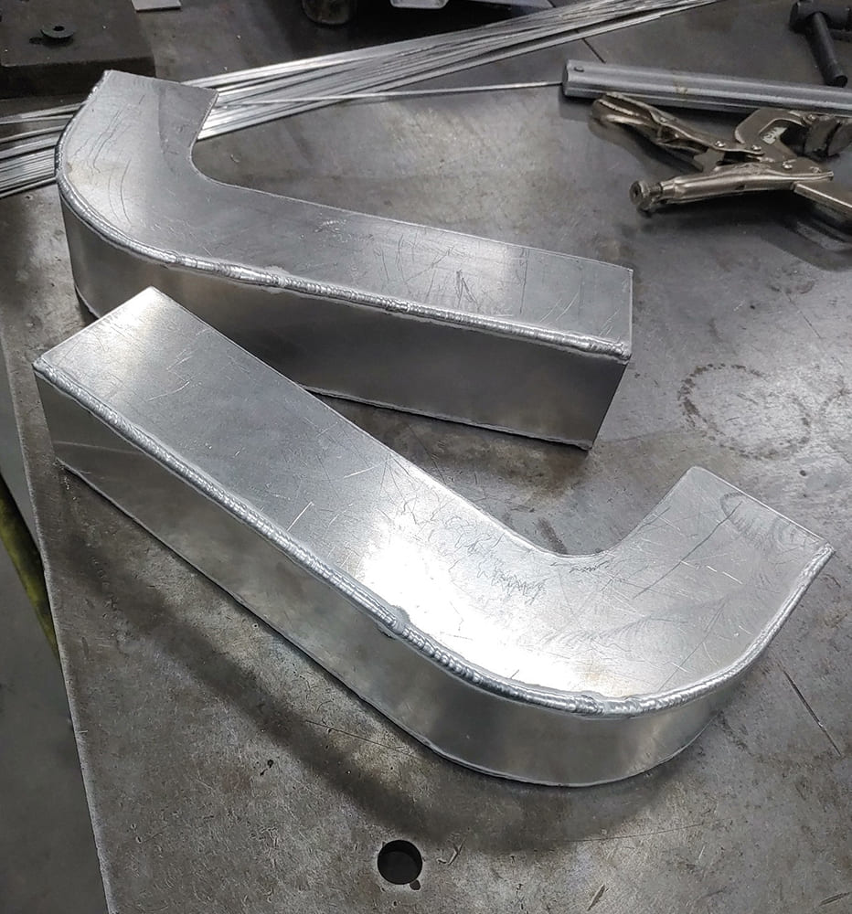 09 1938 Divco hand formed aluminum body corners for lower trim transition
