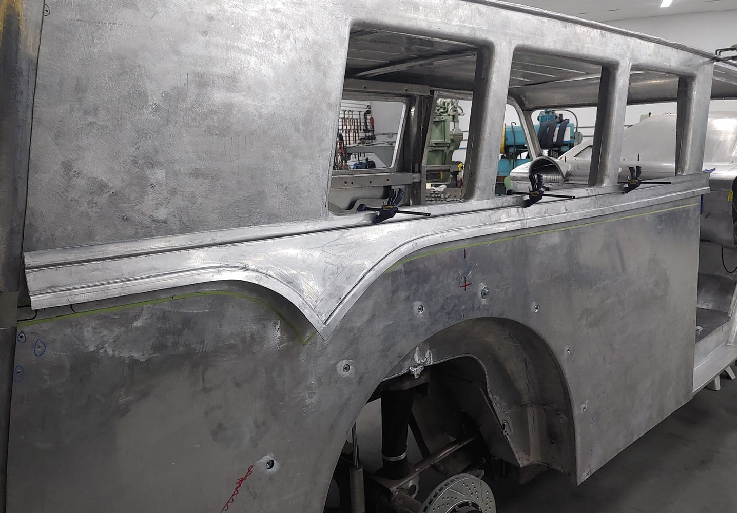 12 1938 Divco upper rear quarter window trim clamped for test fitting