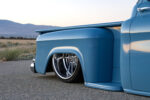 13 1957 Chevy truck rear quarter with deep lipped billet wheels tucked under widened fenders