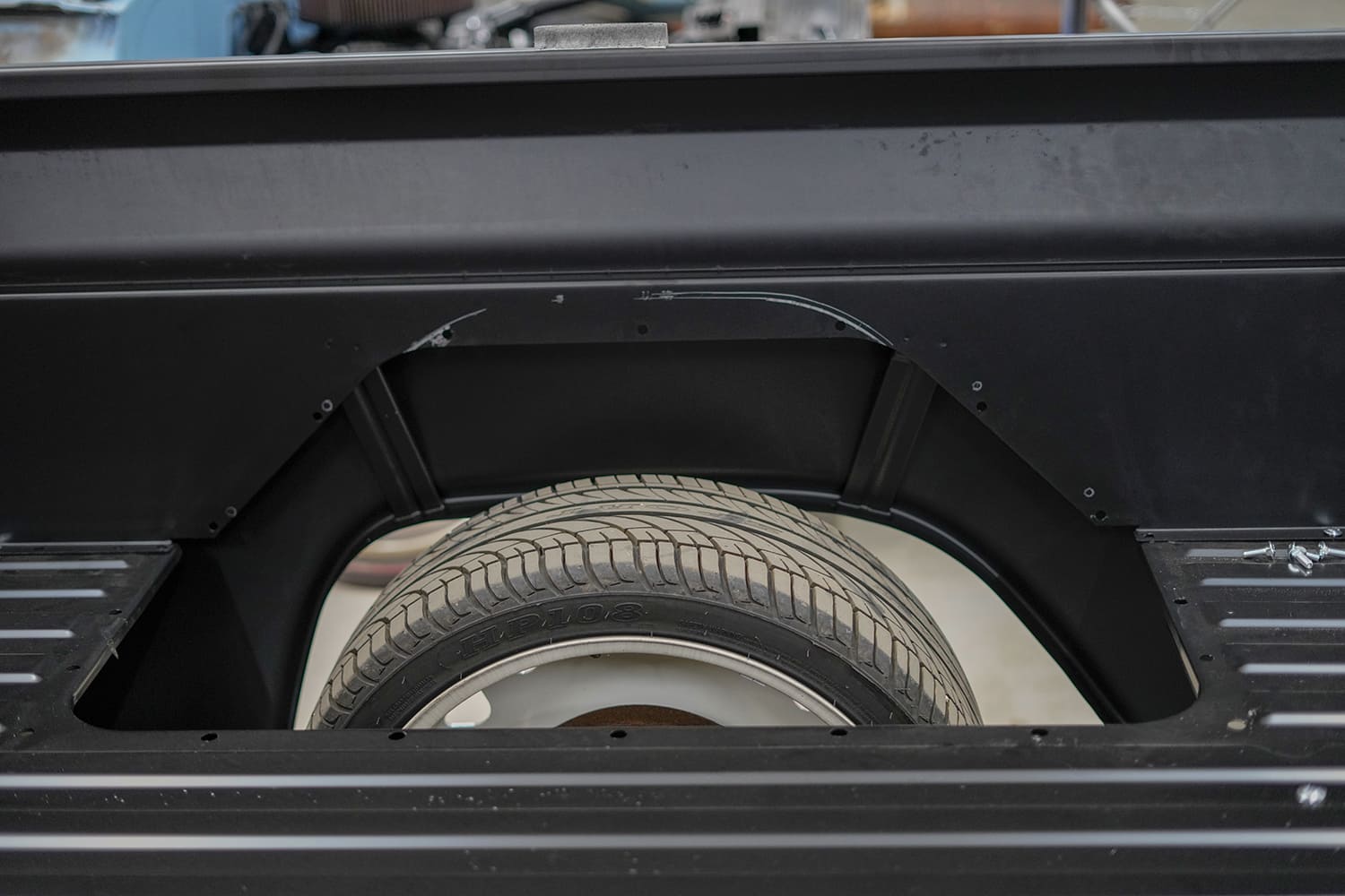 18 View through the inner bedside cutout reveals clearance check over the wheel on the C10