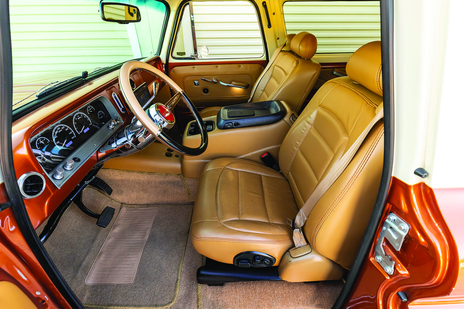 20 1966 Chevy Suburban interior upgraded with leather bucket seats console and custom dash layout