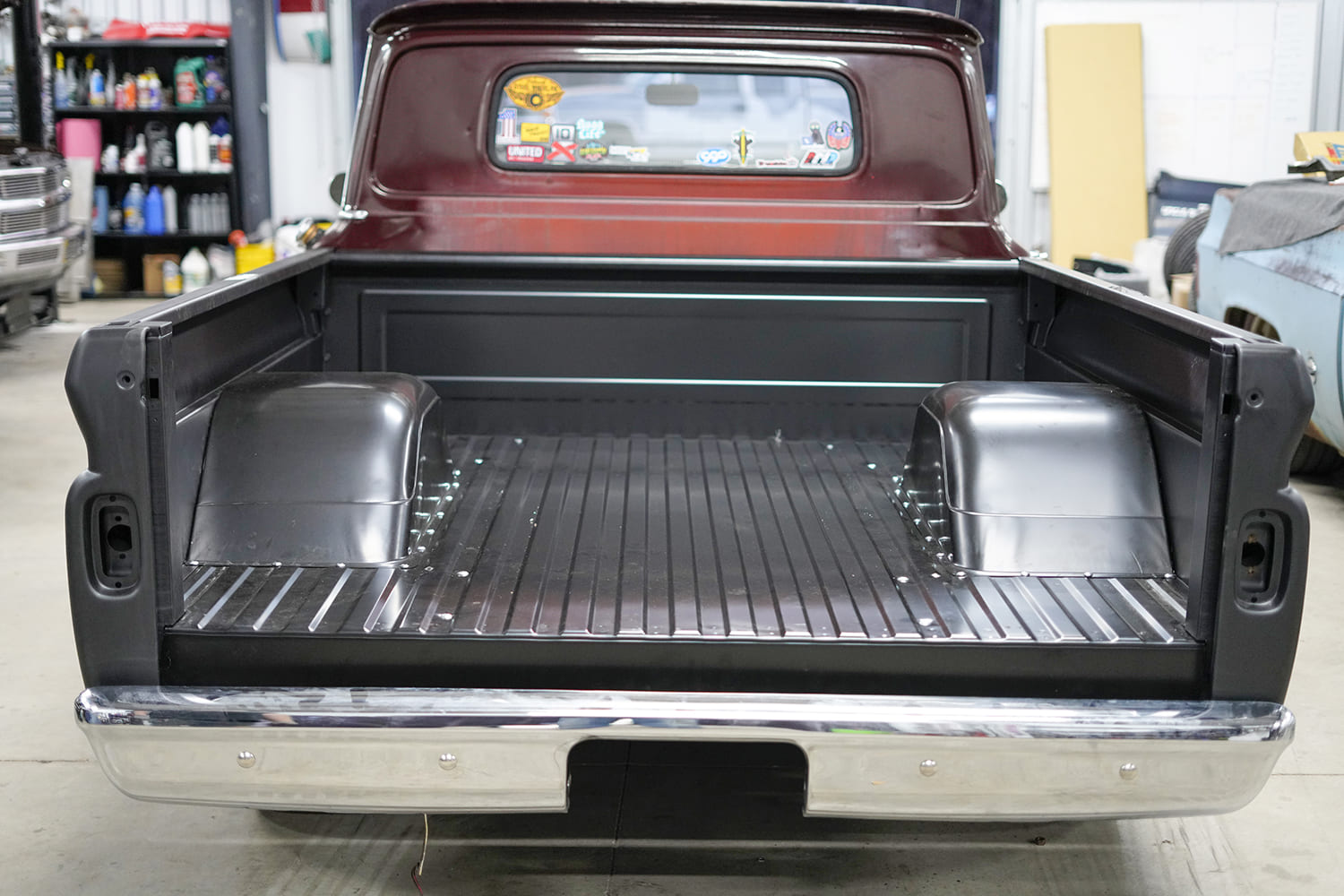 25 Rear facing view reveals completed dual wheel tubs and ribbed steel floor fully mounted in the C10 bed