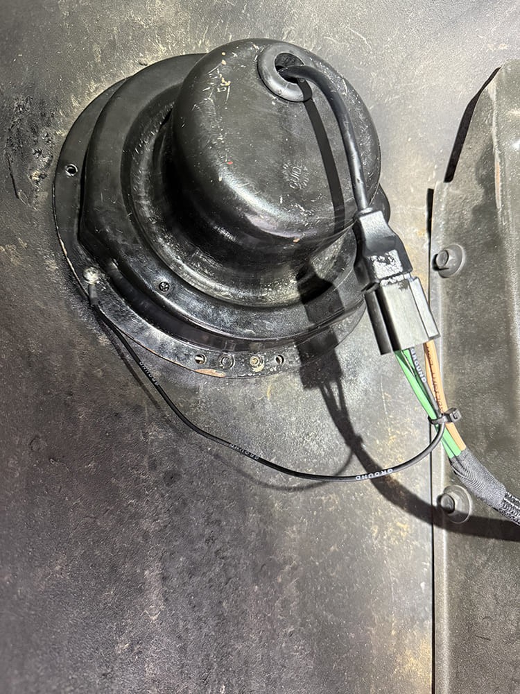 29 Headlight harness secured and connected inside bucket using weather resistant plug and zip ties