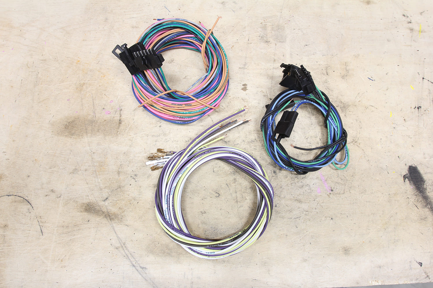 39 Multiple labeled wiring sub harnesses sorted by function for final layout
