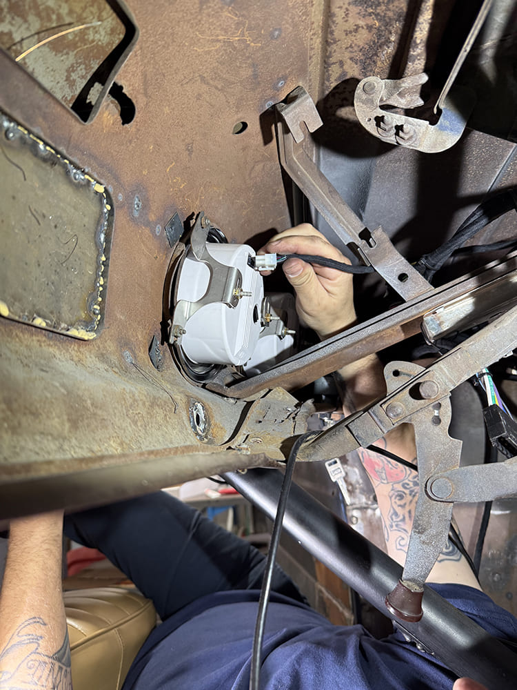 43 Under dash shot of gauge cluster wiring being connected during installation