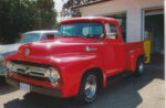00 1956 Ford F 100 patch panel clamped in place under cab corner during rust repair