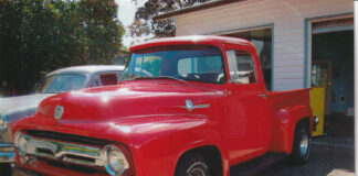 00 1956 Ford F 100 patch panel clamped in place under cab corner during rust repair