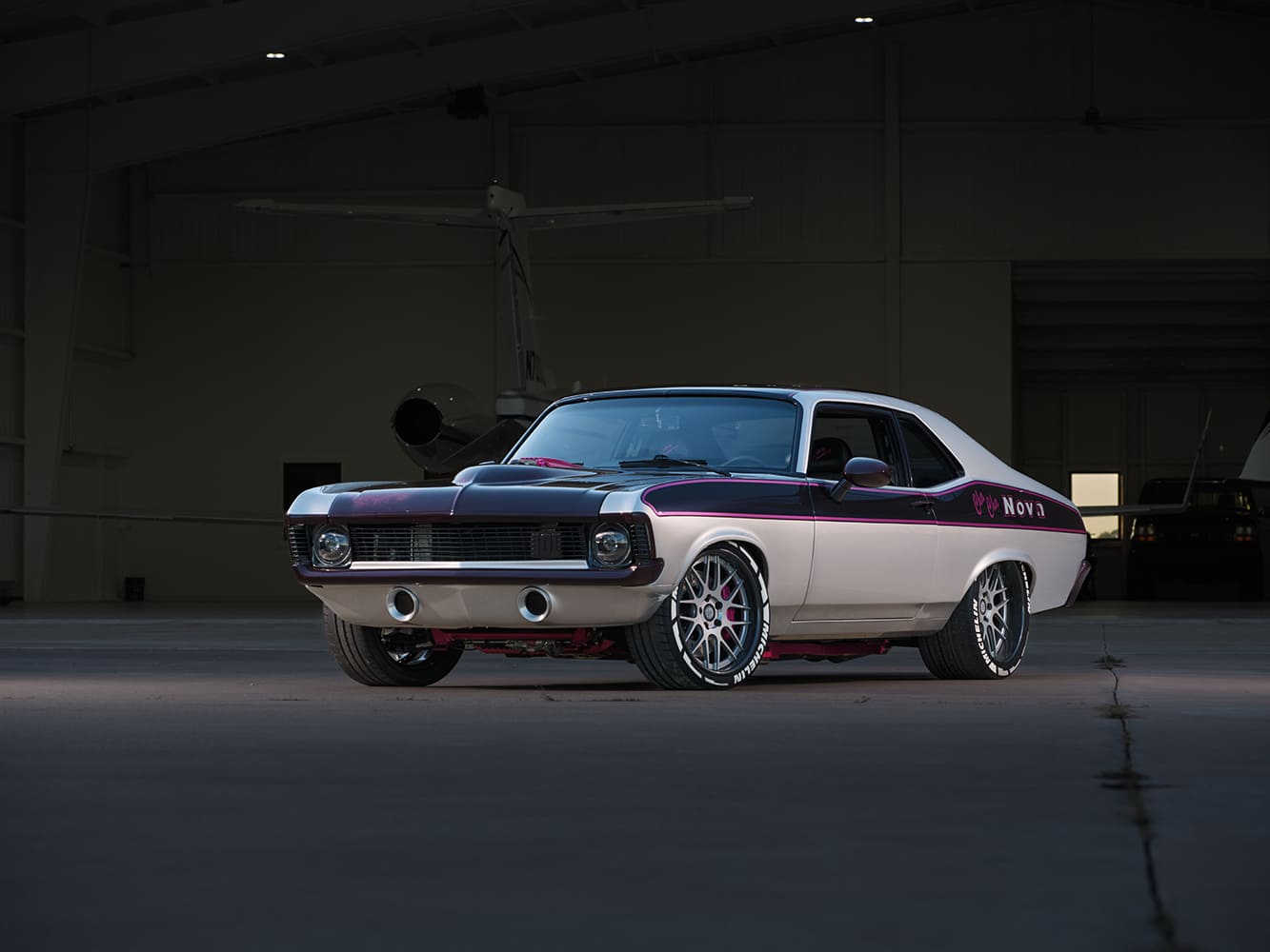 002 1969 Chevy Nova features a custom front valance with dual center exhaust exits