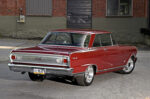003 1965 Chevy Nova rear view with polished trim and wide modern street tires