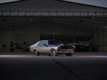 003 1969 Chevy Nova sits low on large multi spoke wheels and Michelin Pilot Sport tires