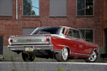 004 1965 Chevy Nova low rear angle showing mini tubbed quarters and dual exhaust