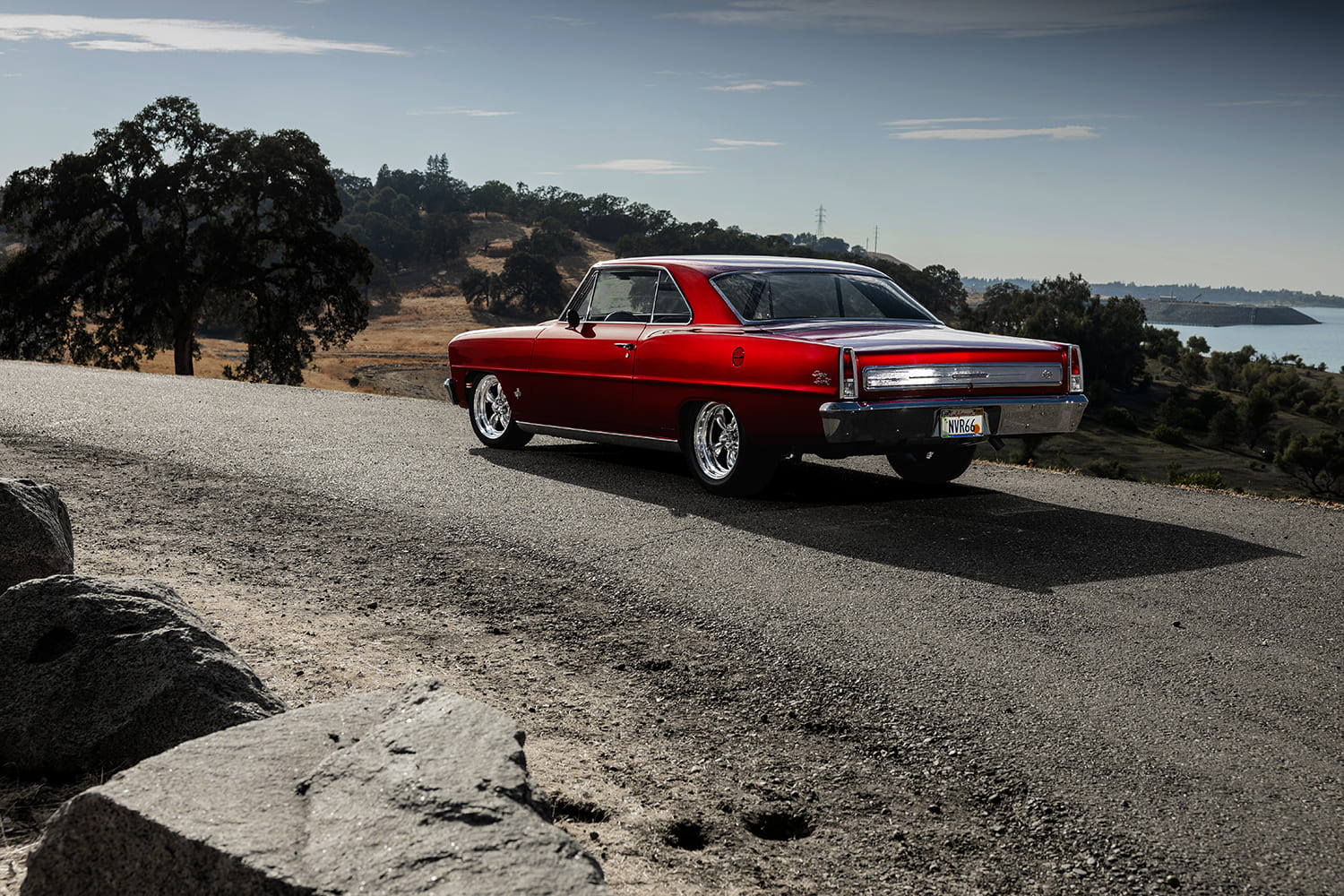 004 1966 Chevy Nova rear shows custom taillights smoothed rear panel and dual exhaust exit