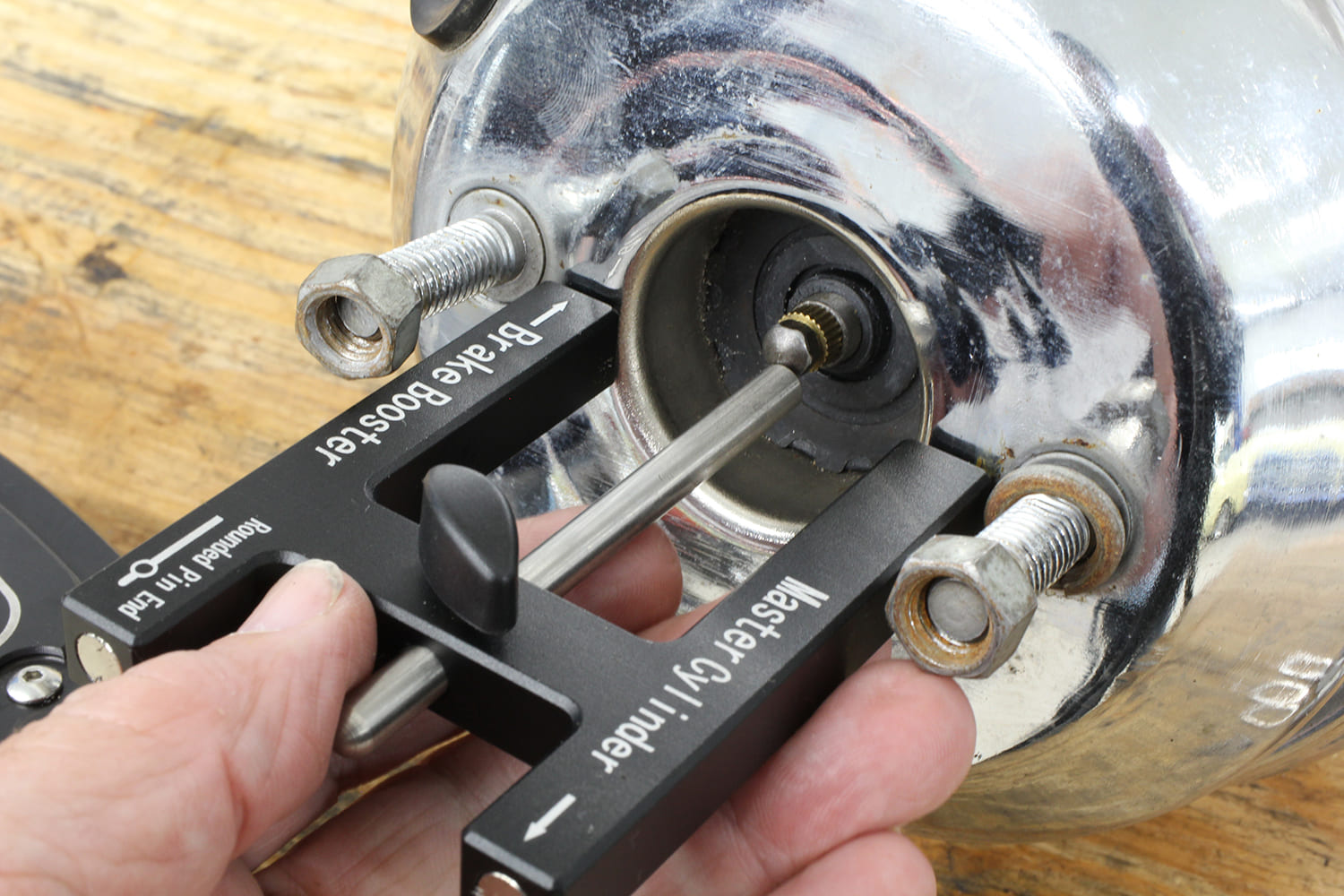 007 Measuring booster pin depth ensures no preload or excessive clearance