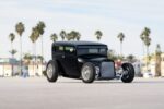 01 1929 Ford Tudor hot rod with chopped roof black paint and chrome knock off wire wheels