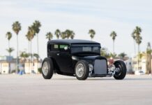 01 1929 Ford Tudor hot rod with chopped roof black paint and chrome knock off wire wheels