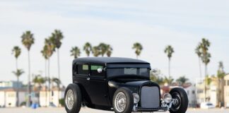 01 1929 Ford Tudor hot rod with chopped roof black paint and chrome knock off wire wheels