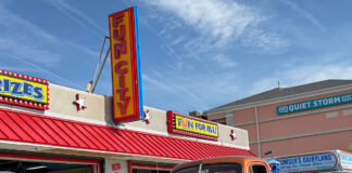 01 1948 Chevrolet 3100 in metallic orange with chrome accents cruising the Ocean City boardwalk