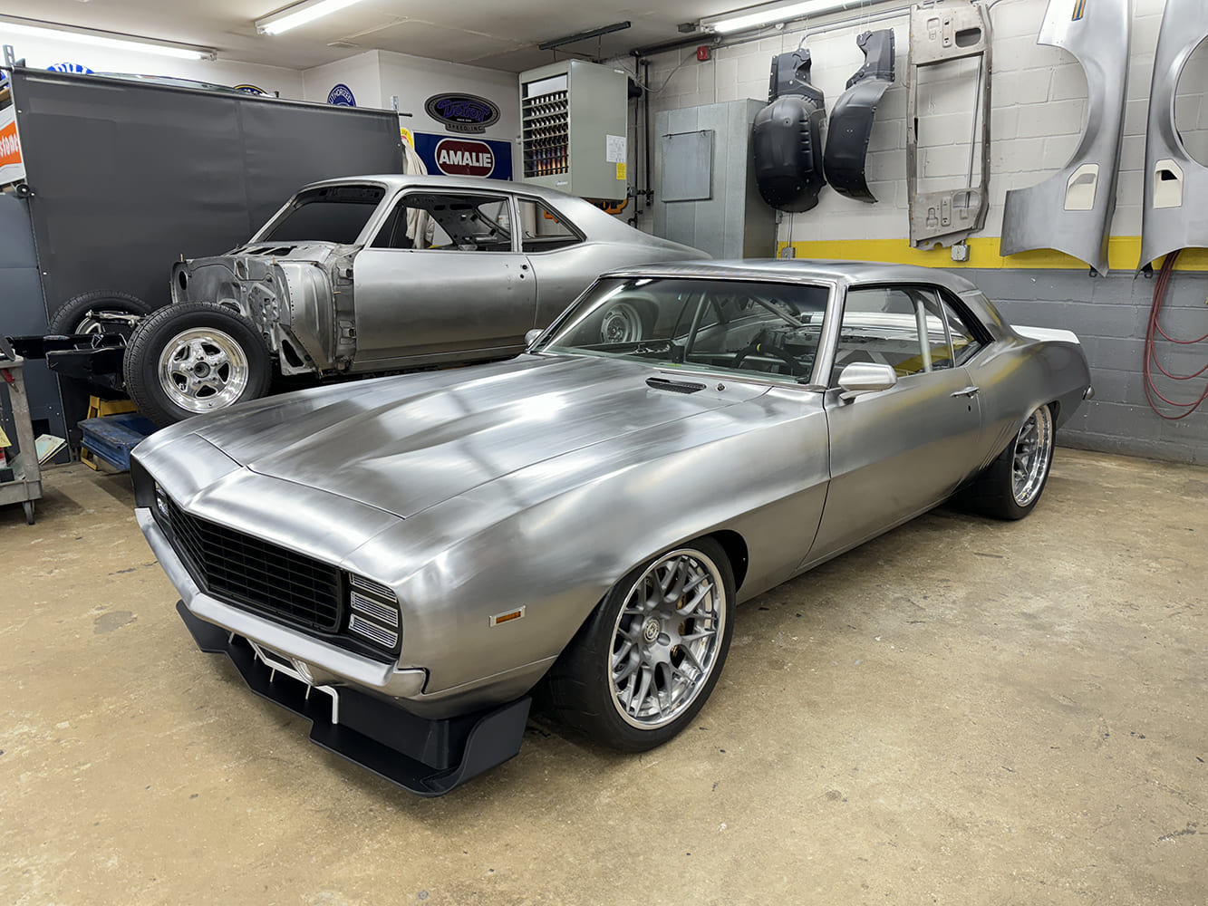 01 1969 Camaro bare metal body with front splitter and custom wheels 01 1969 Camaro bare metal body with front splitter and custom wheels