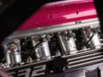 010 1969 Chevy Nova EFI intake shows individual throttle bodies and performance wiring