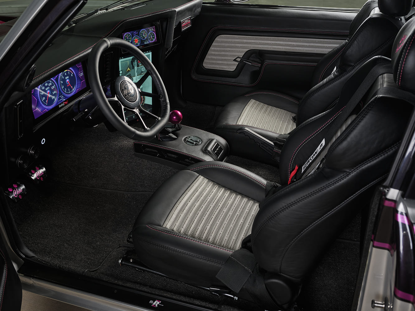 011 1969 Chevy Nova custom cockpit features leather buckets digital dash and billet accents